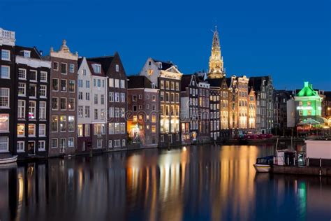 Damrak Canal at Night, Amsterdam, Netherlands Editorial Stock Image ...