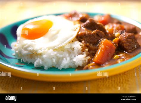 Curry with fried egg Stock Photo - Alamy