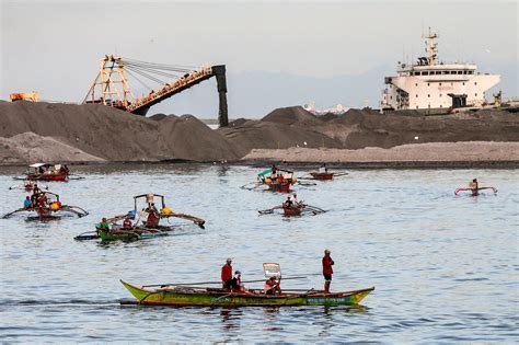 Philippine fishermen balk at land reclamation projects | Flipboard