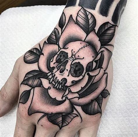 50 Skull Hand Tattoo Designs with Meaning | Art and Design