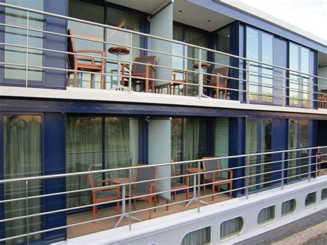 Outside view of the river cruise ship showing a full balcony, a french ...