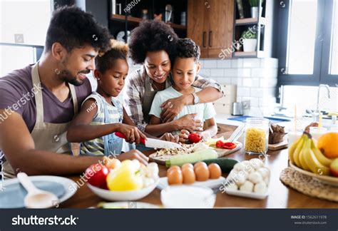 Happy Family Kitchen Having Fun Cooking Stock Photo 1562611978 ...