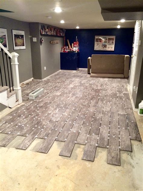 Basement Flooring Renovation – Eclectically Grey Wood-look tile | Tile ...