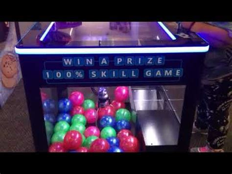 Collegegymvidsfan winning a. plastic ball from Chuck E. Cheese claw ...