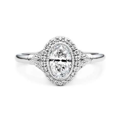 Antique Oval Halo Diamond Engagement Ring | JM Edwards