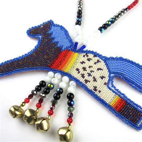 This large Lakota necklace is fully beaded and features an abstract ...