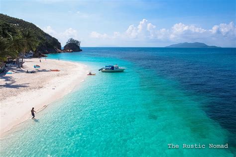 Pulau Rawa or Rawa island is a small tropical paradise, with turquoise ...