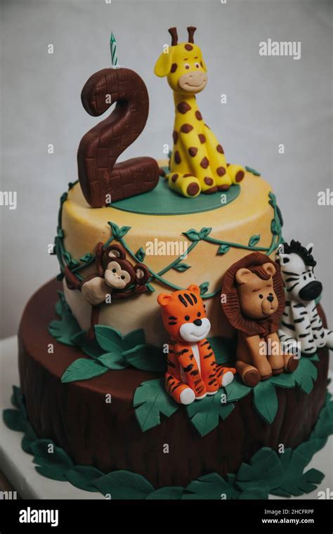 2 year birthday cake with animals Stock Photo - Alamy