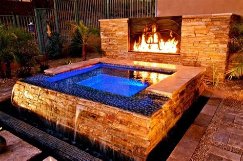 stunning backyard hot tub with water fall | Hot tub backyard, Hot tub ...