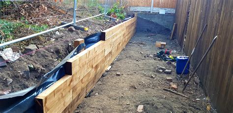 Sleeper retaining wall and fence help | DIYnot Forums