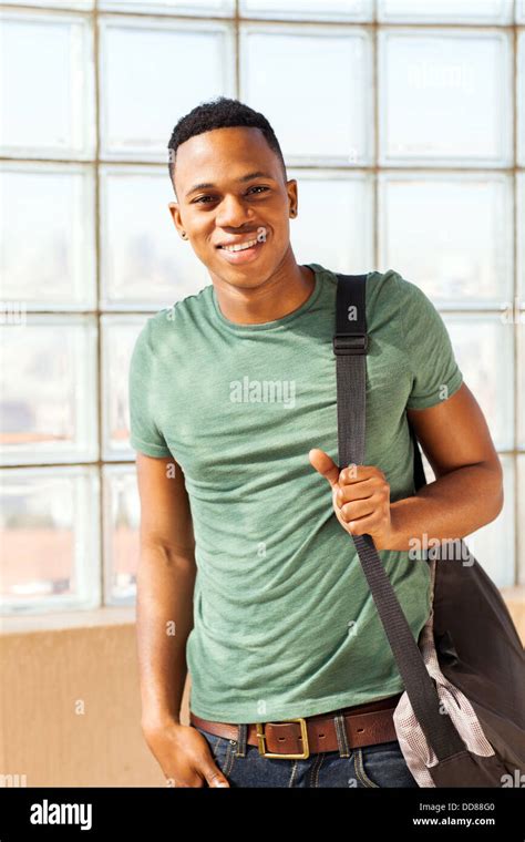 handsome African American boy with a bag Stock Photo - Alamy