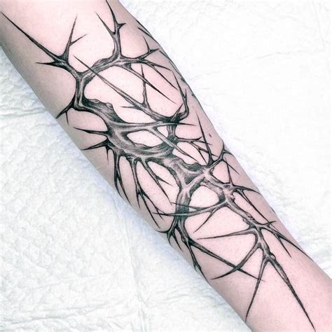 Thorn Tattoo Meaning: Embrace the Symbolic Power of Thorn Tattoo