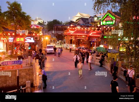 China, Beijing, nightlife around the Silver bar bridge between the ...