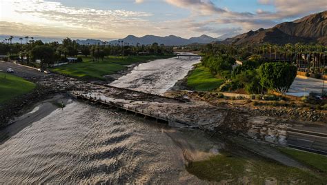 Which Palm Springs-area golf courses were damaged by Tropical Storm Hilary?