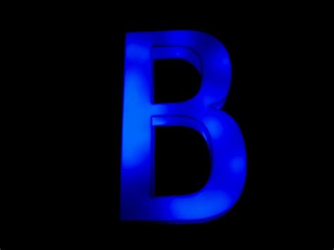 Premium Photo | Blue neon letter b