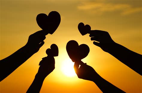 hands holding hearts silhouette - wattsnext - Strategic HR Consultants