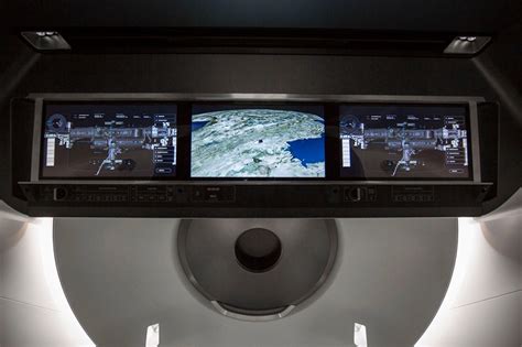 spaceX previews the dragon capsule interior for commercial space flights