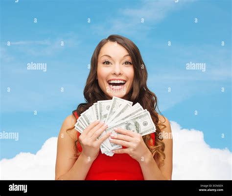 woman in red dress with us dollar money Stock Photo - Alamy