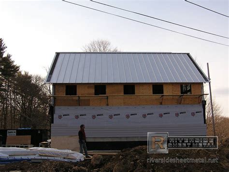 Dove gray aluminum metal roof panel installation