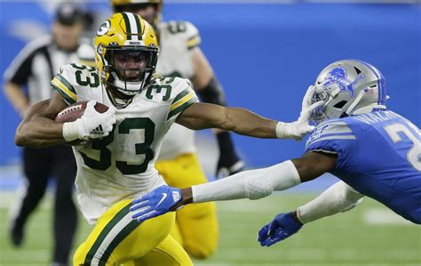 As running backs are devalued, Packers' Aaron Jones enters a contract ...