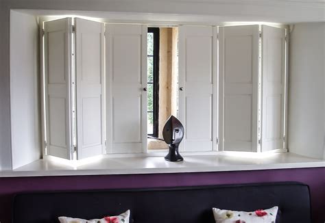 Solid raised panel shutters in silk white | Traditional shutters ...