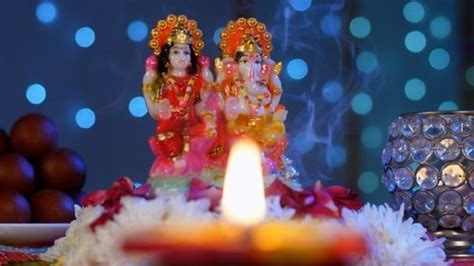 Ganesha And Goddess Lakshmi Decorated With Flower Stock Video | Knot9