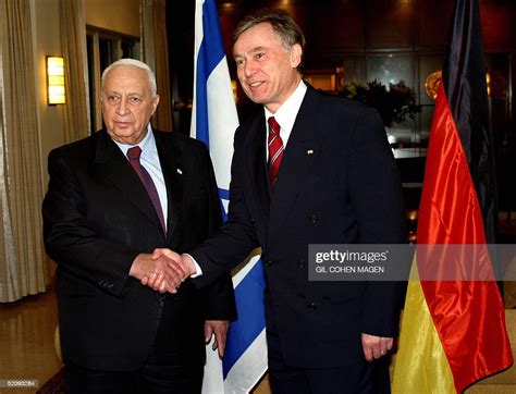 Israeli Prime Minister Ariel Sharon shakes hands with German... News ...