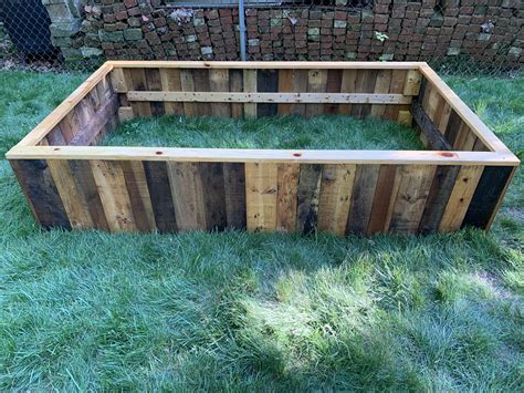 Raised garden bed from pallets. Sealed with linseed oil, will be ...