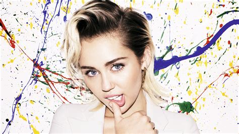 Miley Cyrus: Vibrant 4K Ultra HD Wallpaper with Colorful Paint Splashes