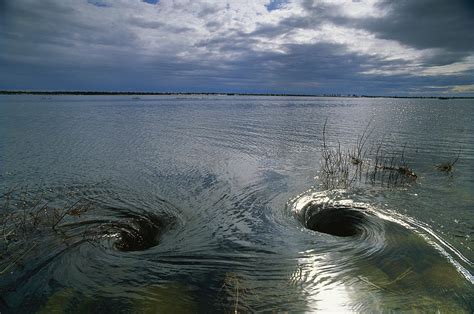 A Pair Of Whirlpools Spinning Photograph by Norbert Rosing