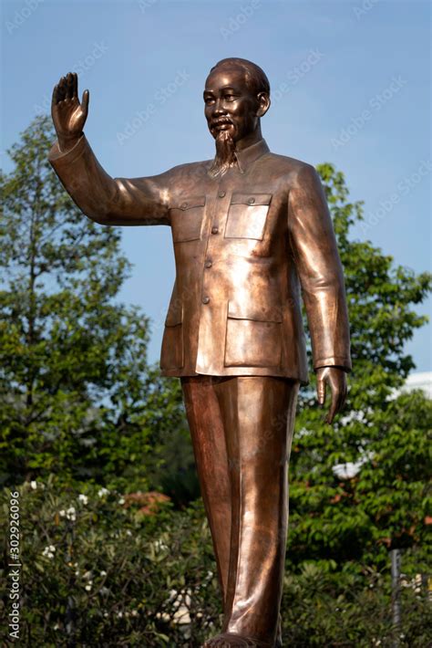 Recently polished bronze statue of Ho Chi Minh standing in the famous ...