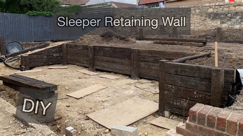 Completing the Sleeper retaining wall - Garden Project - YouTube