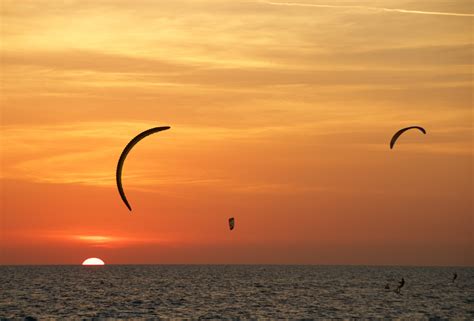 kite surfing at sunset 4k HD Wallpaper