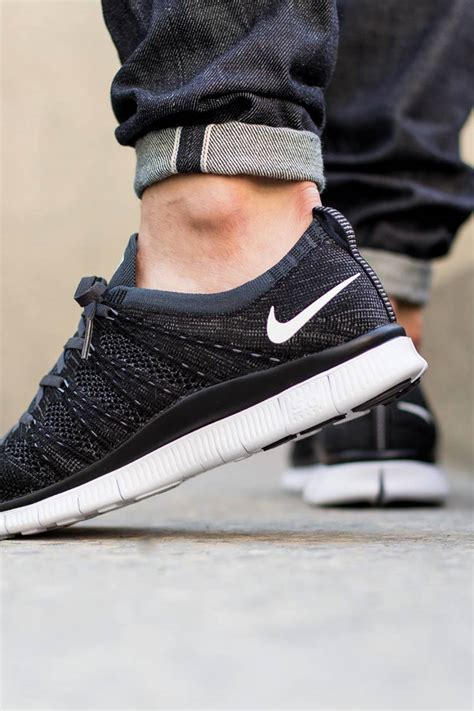 NIKE Black Flyknit NSW | SOLETOPIA