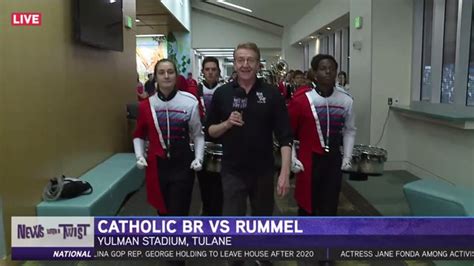 Marching in to Win! Rummel Raiders Football Team and Band | WGNO