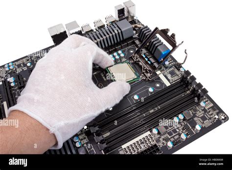 Installation of modern processor in CPU socket Stock Photo - Alamy