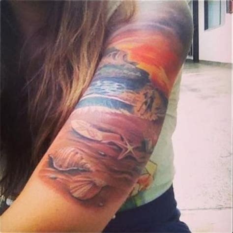 a woman's arm with a colorful tattoo on it