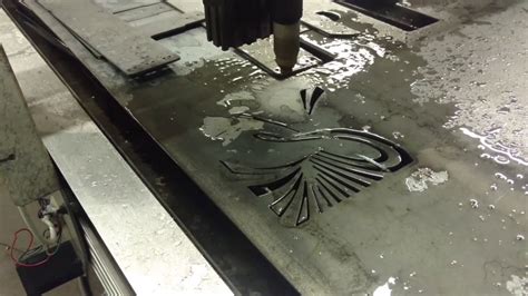 Delusional Designs CNC plasma table cutting some cool artwork. - YouTube