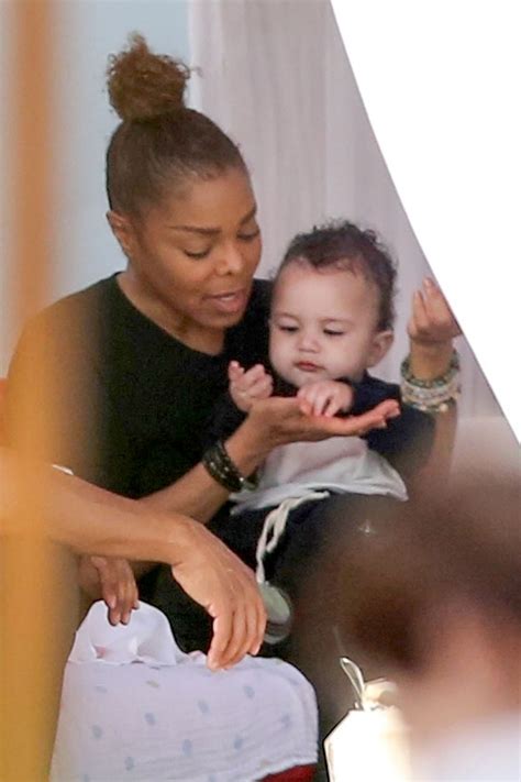 Janet Jackson pictured feeding her baby son Eissa in Miami Beach, Florida