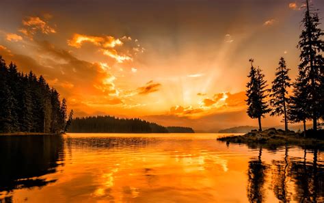 Serene Sunset: HD Wallpaper of an Orange Lake Landscape