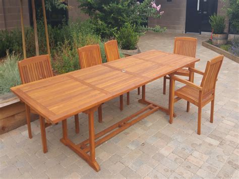 Teak table and chairs - Cal Preserving