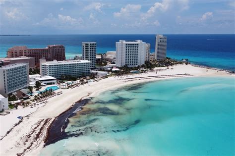 Mexican Navy Deployed To Clear Sargassum Seaweed From Cancun Beaches ...