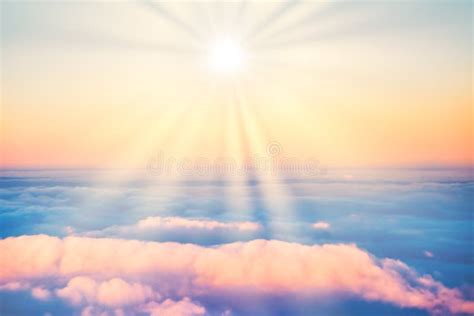 Sun Rays and Clouds Over the Sea Stock Photo - Image of ocean, rainbow ...