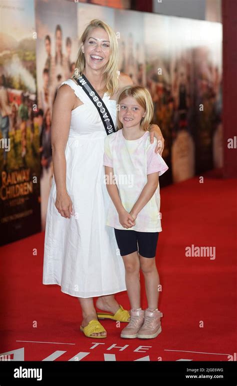 Laura Hamilton and daughter arriving at the Railway Children gala ...