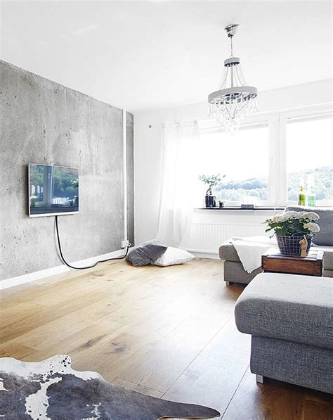 Living room with a concrete wall - COCO LAPINE DESIGN