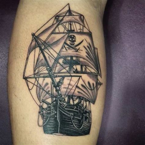 Traditional Pirate Flag Tattoo A pirate flag tattoo shows a level of ...