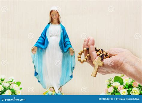 Holy Rosary and the Statue of the Blessed Virgin Mary. Roman Catholic ...