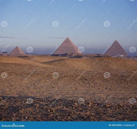 The Pyramids of Giza at Sunrise Stock Photo - Image of bizzare, sand ...