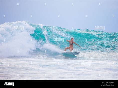 Surfing in Uluwatu, Bali, Indonesia Stock Photo - Alamy