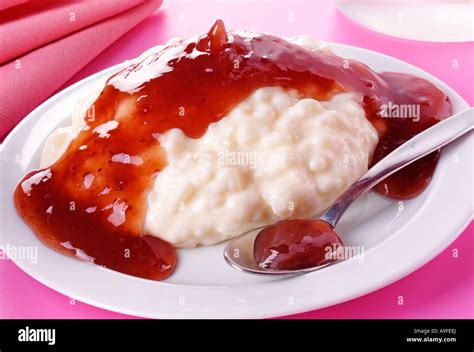 TRADITIONAL RICE PUDDING WITH JAM Stock Photo - Alamy